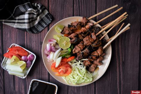  Sate Kambing yang Pedas dan Gurih: Kun Selamat Menikmati Sate Kambing yang Membakar Lidah dan Meleleh di Mulut!